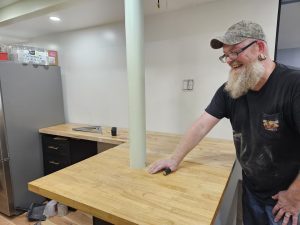 Jared at work on the kitchen carpentry.